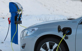 Volvo V60 Plug in hybrid being charged in snow